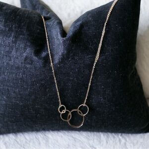 sterling silver four ring necklace